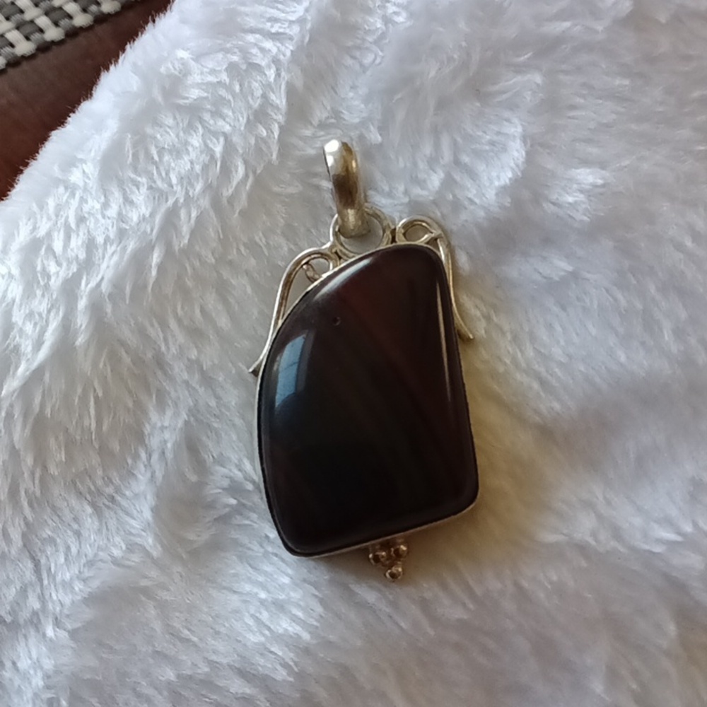 304. 925 STERLING SILVER WRAPPED PENDANT